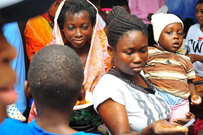 A child receiving care during an SWL health initiative