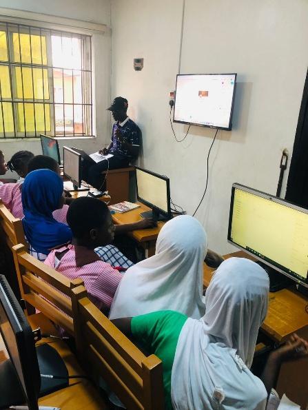Children learning computer skills at the DLASP centre